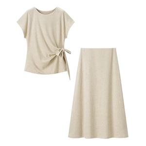 Women's oatmeal knot-side top and A-line skirt set in soft knit fabric on white background