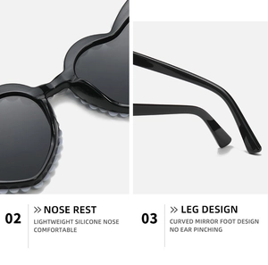Macro shot of comfortable silicone nose pads and curved temples on heart-shaped pearl sunglasses