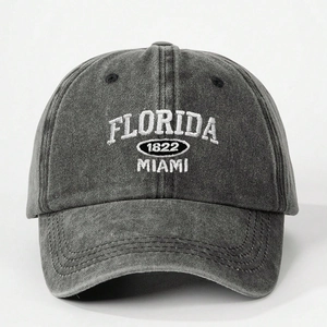 Detail of white 3D embroidery FLORIDA MIAMI 1822 on washed dark grey baseball cap