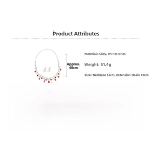 Detail view of water drop jewelry set featuring red gemstones and silver alloy base
