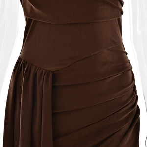 Close-up of brown satin sleeveless dress with asymmetrical waist draping and ruched detail