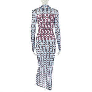 Detail of blue and brown geometric diamond print on a sheer long-sleeve dress fabric
