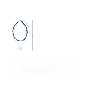 Detail view of double-layer necklace specs with blue heart pendant and beaded chain