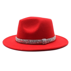 Detailed view of red wool jazz hat featuring luxury silver diamond rhinestone band trim