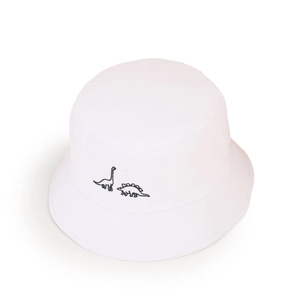 Détail du chapeau bob blanc en coton pour enfants avec broderie de dinosaure noir