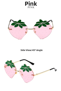 Frameless strawberry shaped pink sunglasses with green leaf accents and gold metal frame