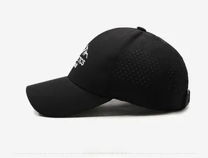 Side view of black quick-dry baseball cap featuring laser-cut ventilation and mountain logo