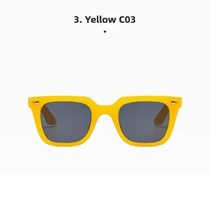 Detailansicht einer leuchtend gelben quadratischen Sonnenbrille mit dunklen Gläsern