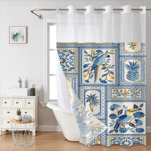 Detail of waffle weave shower curtain featuring tropical parrots and palm leaf patterns