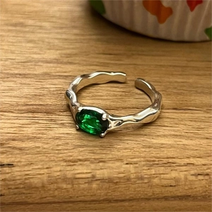 Minimalist 925 silver open ring with green emerald stone and irregular texture finish