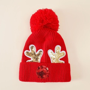 Kids red Christmas knit hat with reindeer sequins and a large pompom decoration