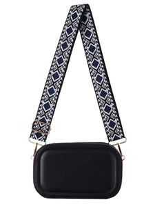 Black leather crossbody bag with wide blue and white geometric diamond pattern strap