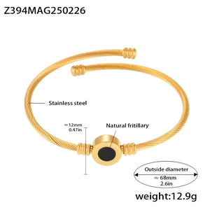 Detail of 18K gold-plated cable bracelet with natural black shell inlay and stainless steel