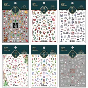 Set of 6 Christmas 5D embossed nail art stickers featuring Santa, reindeer, and snowflakes