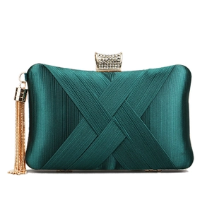 Dark green silk fringe evening clutch bag with woven texture and rhinestone clasp