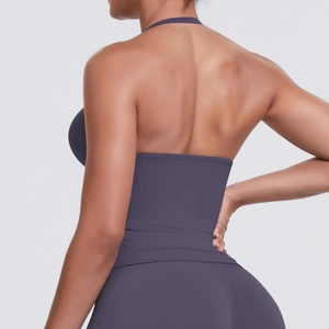 Detail of high-stretch dark purple racerback yoga top with breathable open back design