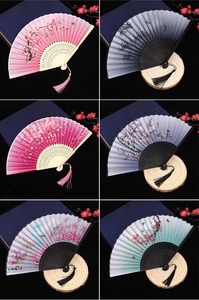 Collage of traditional folding fans with floral patterns, bamboo ribs, and silk tassels