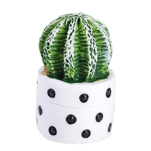 Artificial globe cactus in white polka dot ceramic pot for minimalist home office desk decor