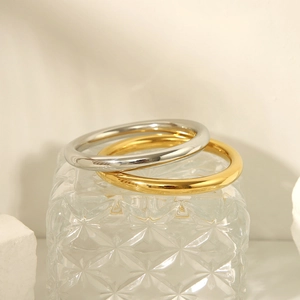 Minimalist 18K gold and silver polished stainless steel hollow tube bangles for women