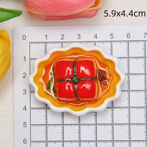 Close-up of 5.9x4.4cm resin hot pot dish fridge magnet with realistic food texture