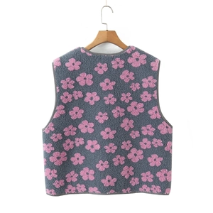 Close-up of grey fleece vest with pink flower print and round neck on wooden hanger