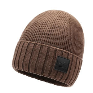 Winter knitted beanie in dark brown with mountain patch and fleece lining for outdoor warmth