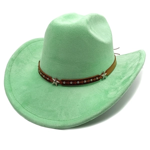 Detail of mint green suede cowboy hat featuring brown leather band and star metal studs