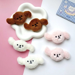 Cute plush dog charms in white, pink, and brown with soft fur and embroidered faces