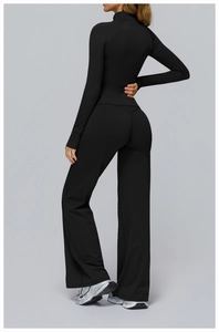 Detail view of the back silhouette on a black brushed yoga set with wide-leg pants