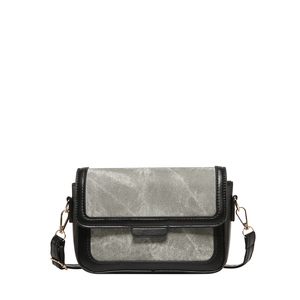 Retro two-tone crossbody bag in black and grey faux leather with gold hardware