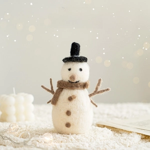 Handmade wool felt snowman decoration with black hat and brown scarf for Christmas decor