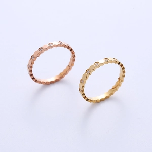 Minimalist geometric honeycomb rings in rose gold and yellow gold with zircon stones