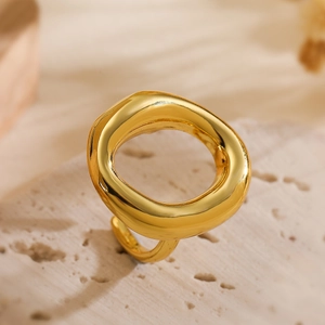 Minimalist geometric hollow open ring with irregular lava texture in 18k gold finish