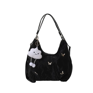Minimalist black hobo shoulder bag with silver butterflies and plush cloud pendant charm