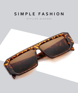 Detailed 45-degree macro view of tortoise shell frame sunglasses with brown lenses