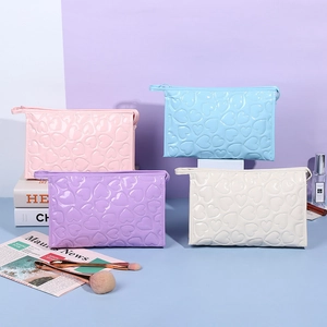 Y2K Y2K style heart embossed makeup bags in pink blue purple and white colors