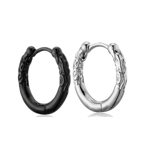 Pair of vintage round huggie hoop earrings with relief cloud patterns in black and silver