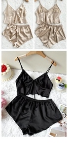 Detail of silk satin camisole set with bow decoration and matching drawstring shorts