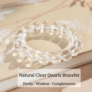 Elegant natural rock crystal beaded bracelet on vintage floral book cover background