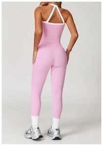 Rückansicht von pinken Yoga-Leggings mit hoher Taille und Sportweste mit weißen Trägern