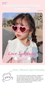 Detail of pink heart-shaped sunglasses with scalloped edges for kids and girls