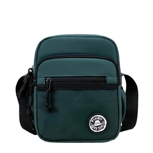 Minimalist dark green crossbody bag with dual front zippers and adjustable black strap