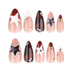 Almond press-on nails with tortoise pattern, gold stars, and faux pearls in dark red