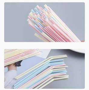 Detail of colorful striped flexible straws showing red blue and yellow bendable plastic