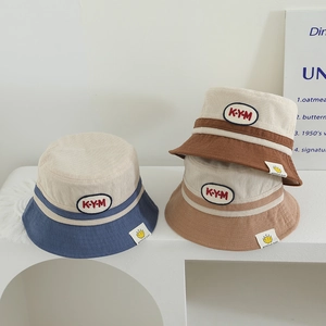 Kids corduroy bucket hat with letter patch and color block design for toddlers
