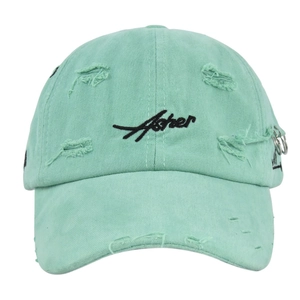 Detail of mint green washed cotton baseball cap with Asher embroidery and metal ring
