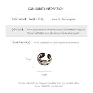 Detailed size guide and acetate plate material specs for the striped open cuff bracelet