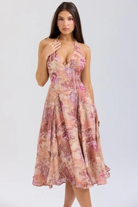Detail of bohemian halter neck dress with paisley print and flowing A-line skirt