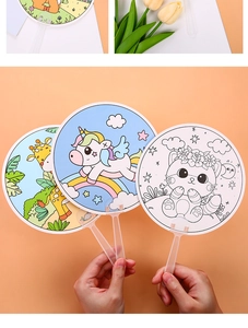 Detail showing DIY paper fans with cartoon animal designs and frosted plastic handles