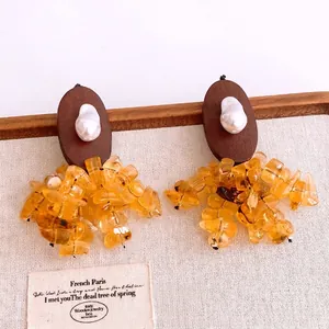 Vintage oval resin earrings with wood base, irregular amber stones and white pearl accents